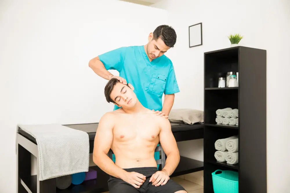 Chiropractor performing precise Gonstead spinal adjustment