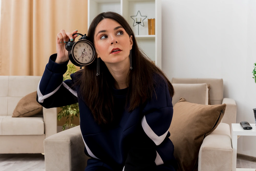 Chiropractor explaining treatment timeline and expectations to patient