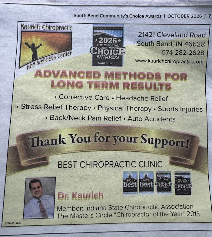 Newspaper advertisement for Kaurich Chiropractic, featuring Dr. Kaurich, listing services like corrective care and stress relief, and showcasing multiple 'Community's Choice Awards' from 2021-2026.